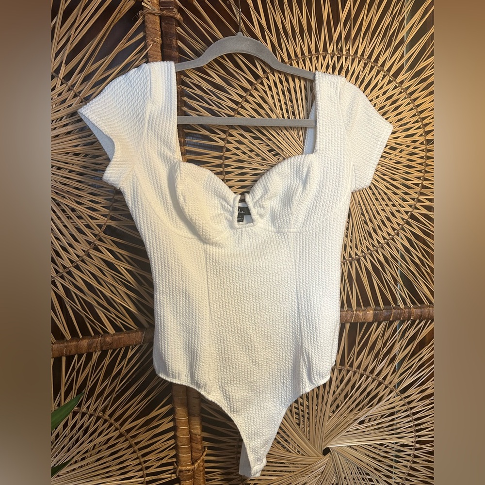 Lulu's Thriving Trend White Ribbed Cap Sleeve Bustier Bodysuit
